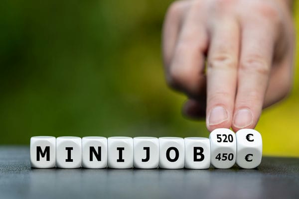 arbeitsformen-minijob Aneinandergelegte Würfel mit dem Schriftzug Minijob 520€